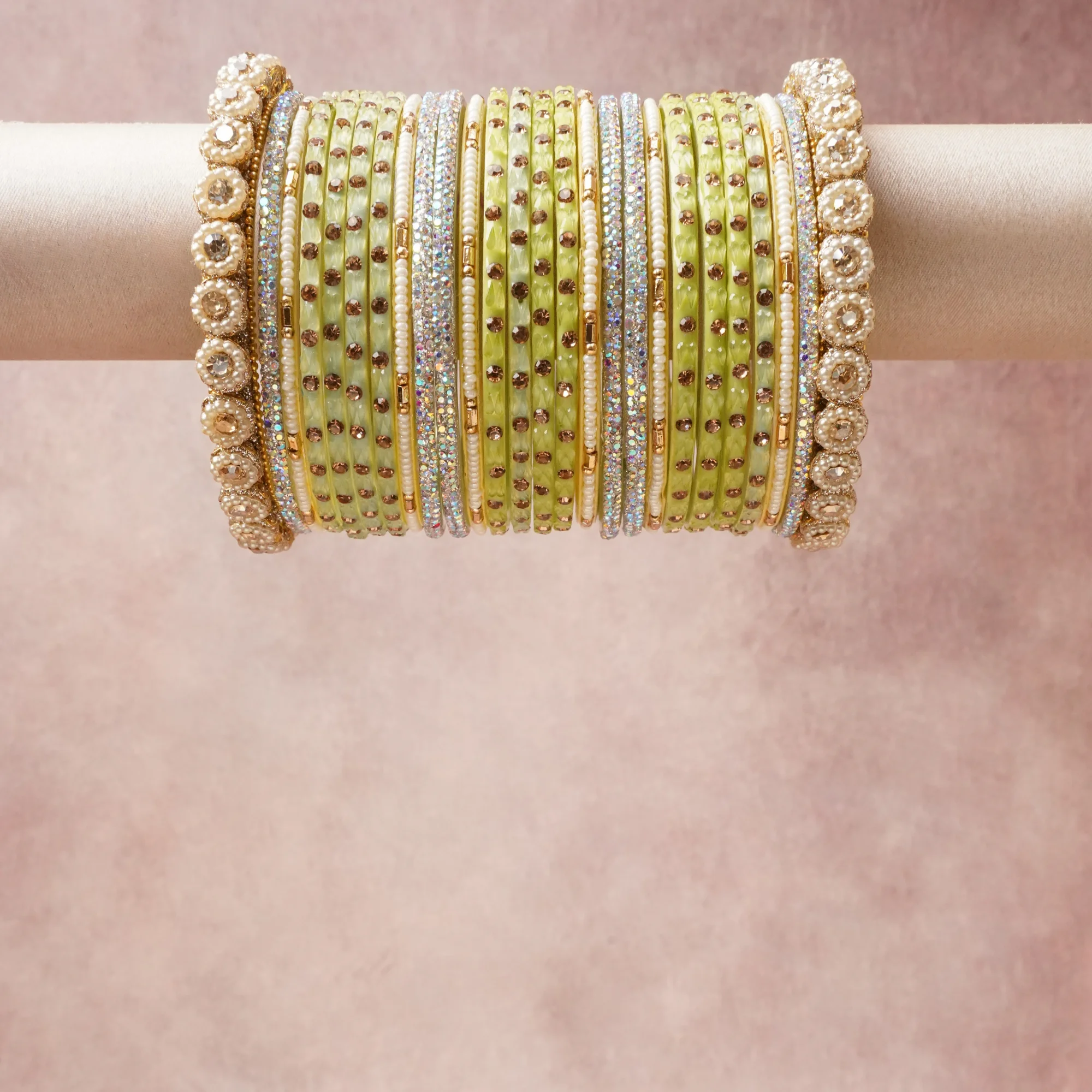 A grounding Sage Green Enamel forms the heart of the set, while touches of Creamy White, Gold, Iridescent Crystal add charm.

A thoughtful composition of Gold-plated Brass, Enamel, Faux Pearls, Glass Crystals, Resin, designed to feel complete without being heavy.
Each element layers seamlessly, creating a look that is refined, wearable and quietly striking.